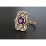 ART DECO STYLE AMETHYST AND DIAMOND PLAQUE RING the central round cut amethyst approximately 0.8cts,