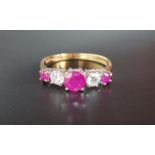 GRADUATED RUBY AND DIAMOND FIVE STONE RING the central round cut ruby approximately 0.5cts flanked