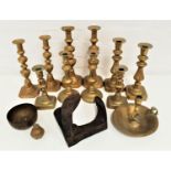 FIVE PAIRS OF KNOPPED CANDLESTICKS ranging in height from 19.5cm to 31cm high, together with a bell,