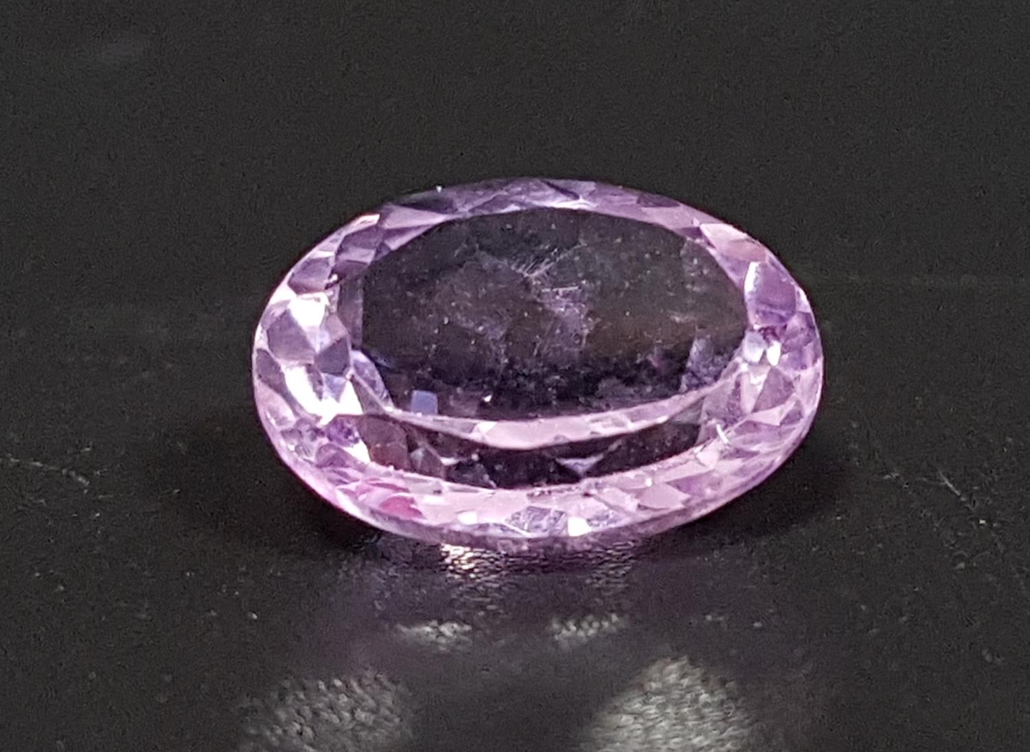 CERTIFIED LOOSE AMETHYST the oval cut natural amethyst quartz weighing 5.73cts, with GJSPC