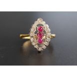 RUBY AND DIAMOND PLAQUE RING the central three rubies in vertical setting totaling approximately 0.