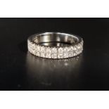 DIAMOND TWO ROW HALF ETERNITY RING the diamonds totaling approximately 0.65cts, in eighteen carat