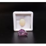 TWO CERTIFIED LOOSE NATURAL GEMSTONES comprising an oval cabochon opal weighing 2.60cts, with GLI