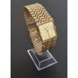 NINE CARAT GOLD RECORD DE LUXE GENTLEMAN'S WRISTWATCH the dial with five minute baton markers and