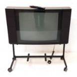 BANG & OLUFSEN BEOVISION LX2502 TELEVISION with a 25" screen, on a wheeled stand, with remote