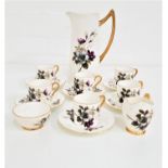 AYNSLEY COFFEE SERVICE decorated with a white ground with flowers and gilt highlights, comprising