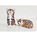 TWO ROYAL CROWN DERBY CAT PAPERWEIGHTS both with buttons, 8cm high and 8cm long (2)
