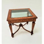 CONTINENTAL WALNUT AND OAK INLAID OCCASIONAL TABLE with an inset square glass top, standing on