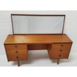SYMBOL TEAK KNEEHOLE DRESSING TABLE with an oblong mirror back(previously wall mounted) above an