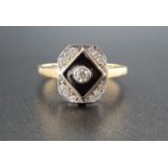 ART DECO STYLE DIAMOND AND BLACK ENAMEL RING the central bezel set diamond approximately 0.1cts in