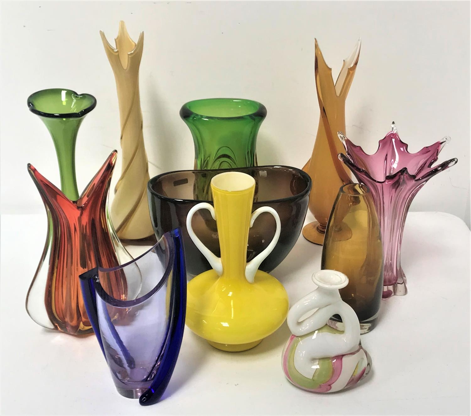 SELECTION OF COLOURFUL GLASS VASES of various sizes and designs including Chribska and cased glass