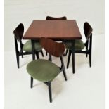 RETRO G PLAN DARK TEAK DRAW LEAF DINING TABLE AND CHAIRS the table standing on shaped supports,