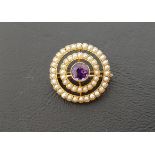 EDWARDIAN MURRLE BENNETT & CO. AMETHYST AND SEED PEARL BROOCH/ PENDANT in fifteen carat gold, the