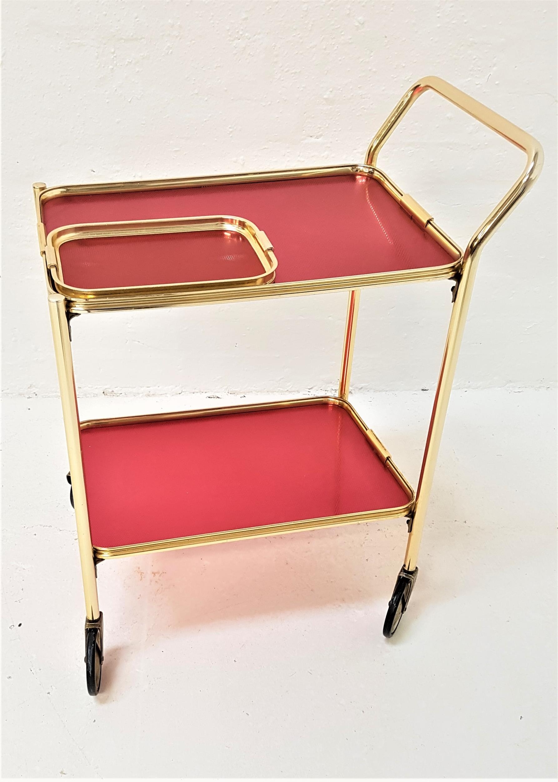 RETRO WOODMET HOSTESS TROLLEY in aluminium with two red tiers, on castors, 76cm high, together