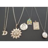 SIX SILVER PENDANTS including two Saint Christopher pendants, one with car and plane to reverse; a