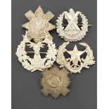 SELECTION OF FIVE METAL MILITARY CAP BADGES including the Cameronians, Cameron Highlanders, Highland