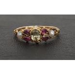 EDWARDIAN GEM AND SEED PEARL SET RING the central yellow/green gem flanked by pink gemstones and