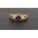 PRETTY 'SUFFRAGETTE' RING the central amethyst flanked by pearls and peridots representing the