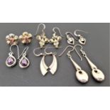 SIX PAIRS OF SILVER EARRINGS including a pair of purple CZ set drop earrings, a pair of cabochon gem
