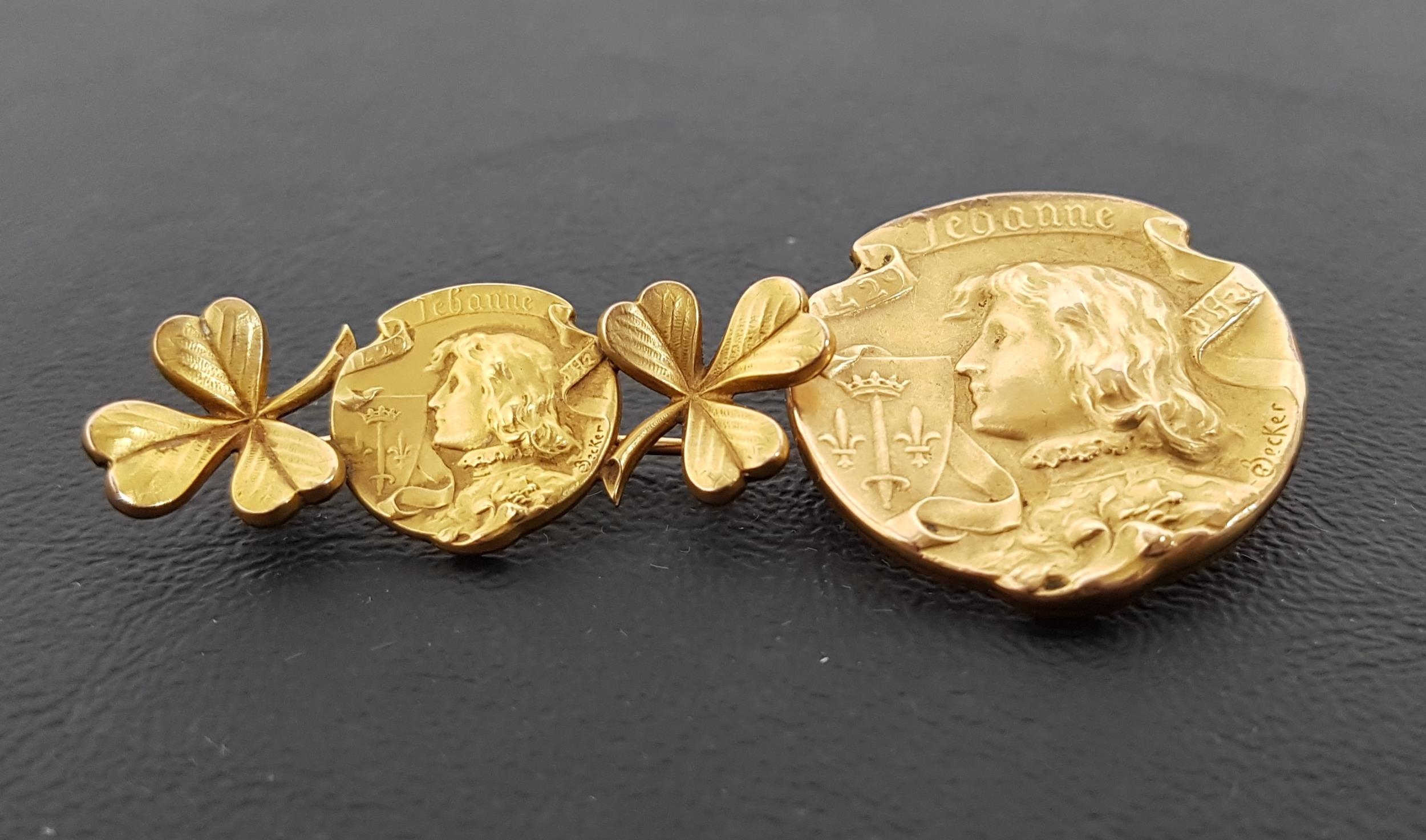 TWO ART NOUVEAU GOLD PLATED 'FIX' BROOCHES both depicting Joan of Arc, one with additional three