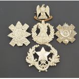 SELECTION OF FIVE METAL MILITARY CAP BADGES including the Royal Scots Greys, Cameron Highlanders,