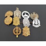 SELECTION OF MILITARY CAP BADGES including the Auxiliary Territorial Services, South Wales