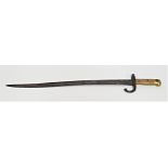 19th CENTURY FRENCH CHASSEPOT SWORD BAYONET with a shaped blade 57cm long and brass ribbed handle,