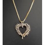 MULTI DIAMOND HEART PENDANT in unmarked gold and on nine carat gold chain, the chain approximately