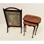 NEST OF TWO MAHOGANY OCCASIONAL TABLES with shaped tops above a shaped frieze, standing on slender