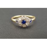 ART DECO SAPPHIRE AND DIAMOND CLUSTER RING the central sapphire in six diamond surround totaling 0.