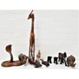 SELECTION OF CARVED WOOD ANIMALS including a giraffe, cobra, three elephants, two rhinoceros,