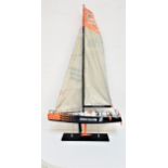 MODEL YACHT of the Ericsson boat used in the 2008-2009 Volvo Ocean Race, with full rigging,