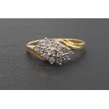 DIAMOND CLUSTER RING on eighteen carat gold shank with twist setting, the diamonds totaling