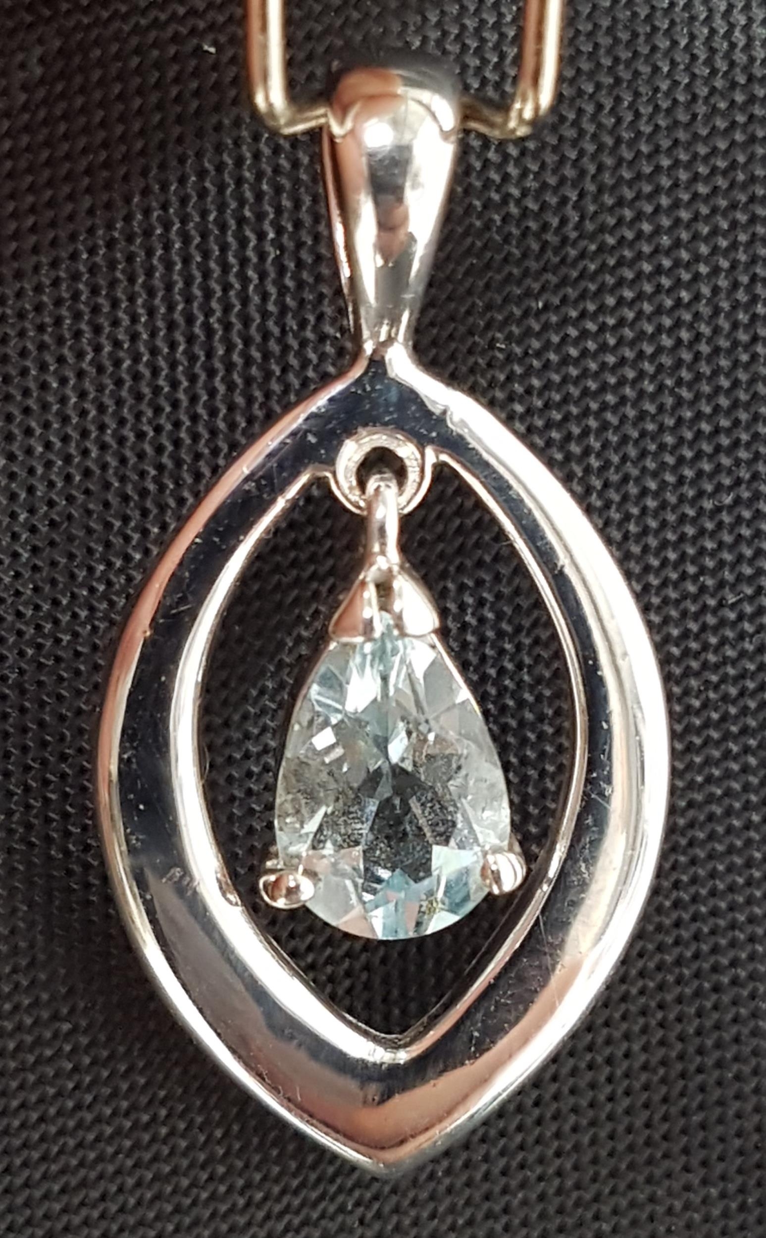 AQUAMARINE SET PENDANT with pear cut aquamarine suspended to the centre of the navette shaped nine - Image 2 of 2