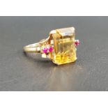 CITRINE AND RUBY DRESS RING the large central emerald cut citrine measuring 13.5mm x 10mm x 6.
