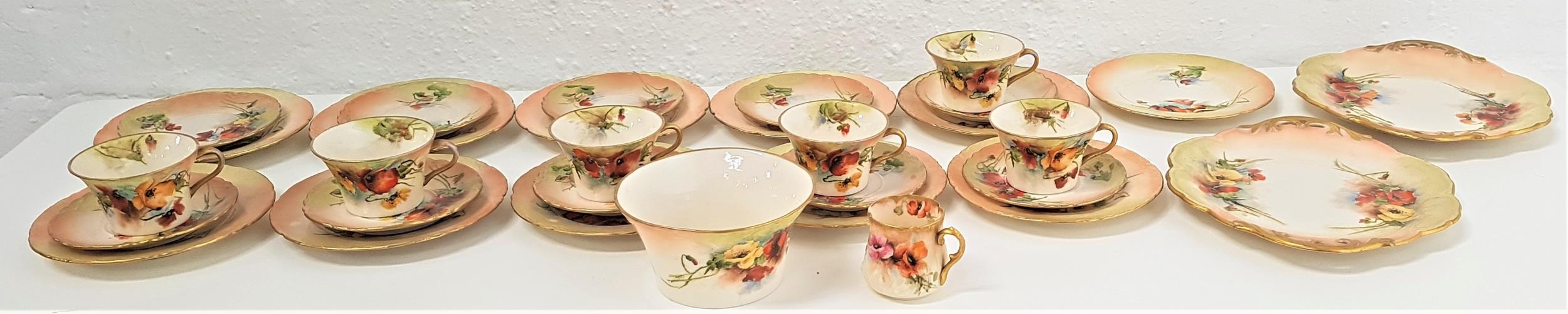 NAUTILUS PORCELAIN TEA SERVICE with floral decoration and gilt highlights, comprising tea cups and