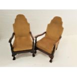 PAIR OF MAHOGANY ARMCHAIRS with shaped padded backs above shaped arms with turned column supports