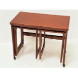 MCINTOSH TEAK OCCASIONAL TABLE with an oblong fold over rotating top above two pull out occasional