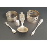SELECTION OF SILVER ITEMS comprising a pierced thistle decorated napkin ring, Edinburgh 1963;
