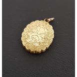UNMARKED GOLD LOCKET PENDANT with engraved decoration overall, scalloped edge detail and applied