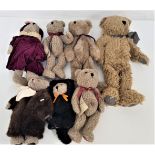 SEVEN BOYD BEARS all in brown plush and all with original labels, five with numbered plastic bags (