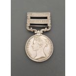 BRITISH PUNJAB MEDAL with two bars, Mooltan and Goojerat, named to Corporal T. Taylor, 32nd Foot