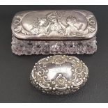 EDWARDIAN SILVER TOPPED GLASS TRINKET BOX the cover with embossed decoration of three female
