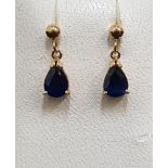 PAIR OF SAPPHIRE DROP EARRINGS the pear cut sapphires on each approximately 0.5cts, in nine carat