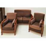 OAK FRAMED BEGERE SUITE comprising a two seat sofa, 134cm wide, and two armchairs, all with double