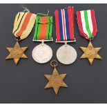 GROUP OF FIVE WWII MEDALS including The 1939-1945 Star, The Africa Star and ribbon, The Italy Star
