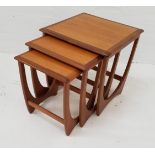 G PLAN NEST OF TABLES with square tops, standing on shaped supports, 51cm high