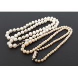 GRADUATED PEARL NECKLACE with marcasite set silver clasp, 41.2cm long; together with another