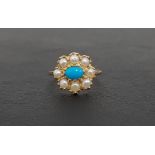 TURQUOISE AND PEARL CLUSTER RING the central oval cabochon turquoise in eight pearl surround, on