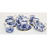 ROYAL CROWN DERBY TEA SET decorated in the Willow pattern, comprising a tea pot, twin handled